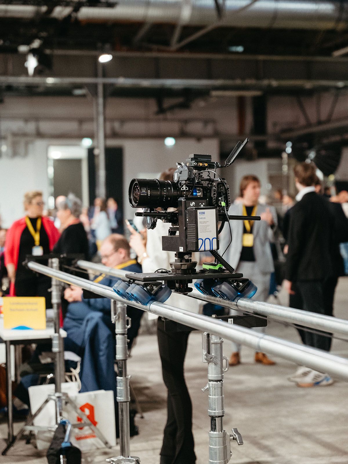 A high-end cinema camera on a dolly track, used by the Visionary Berlin team to capture dynamic, smooth, and cinematic shots during the FDP Bundesparteitag 2023.