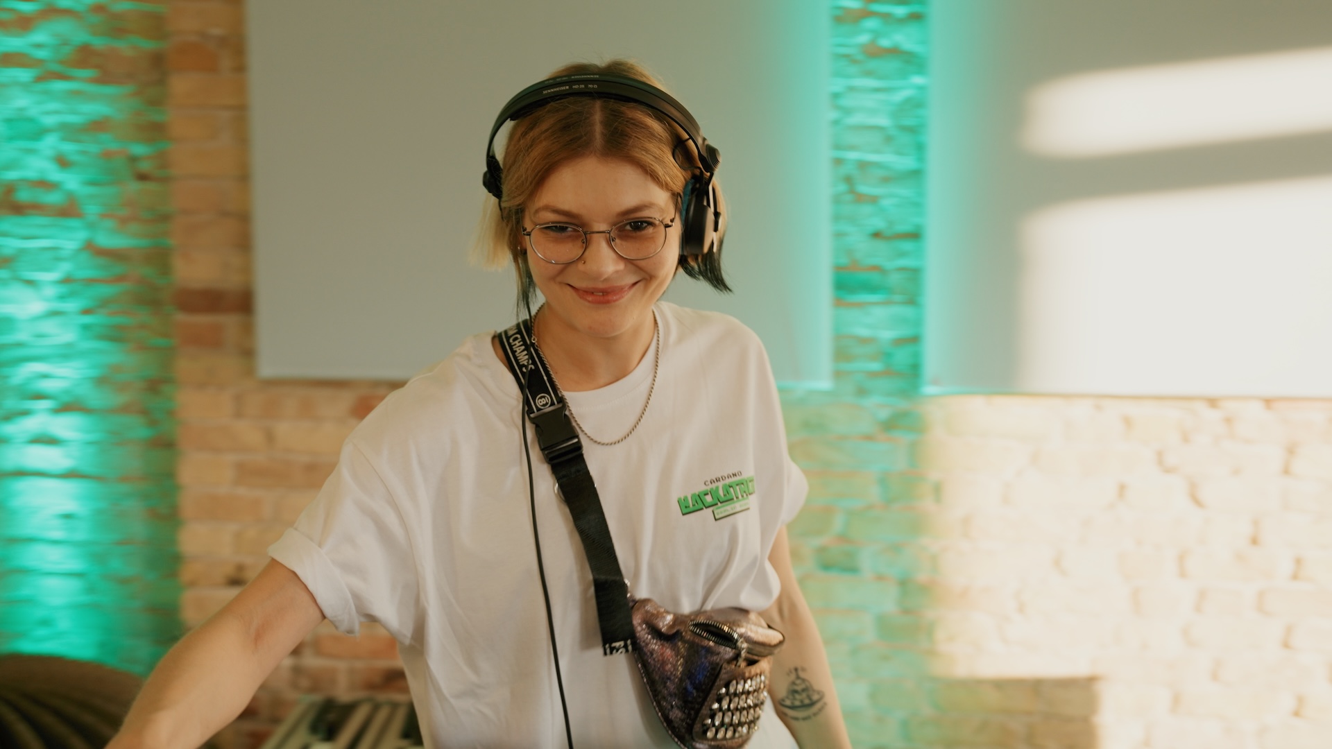 A stylish portrait of a DJ, representing the creative and modern vibe of the w3.hub community, as seen in the brand film by Visionary Berlin.